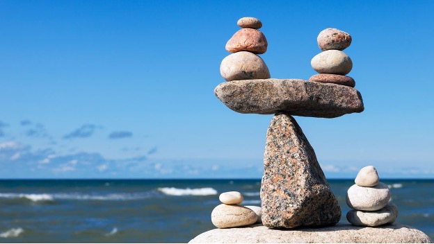 rocks piled up in a balanced form -maintaining good mental health balance in your everyday life